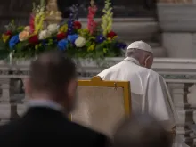 Pope Francis prays the rosary before an icon of Our Lady of Help in St. Peter's Basilica May 1, 2021.